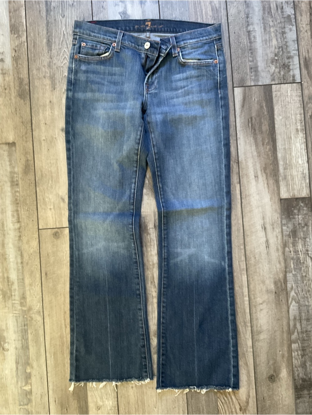 7 For All Mankind Medium Blue Boot Cut Jeans with Raw Hem